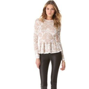 Torn by Ronny Kobo Peplum Top on Sale!